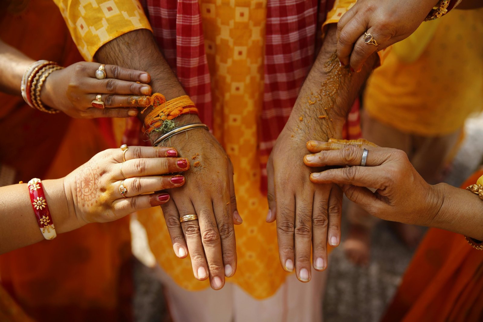 About Close-up of traditional Indian wedding ritual with henna and turmeric in Kolkata, India.